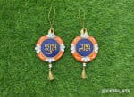 Shubh Labh Cowrie Shell Wall Hangings – Orange & Navy Pair - view 1